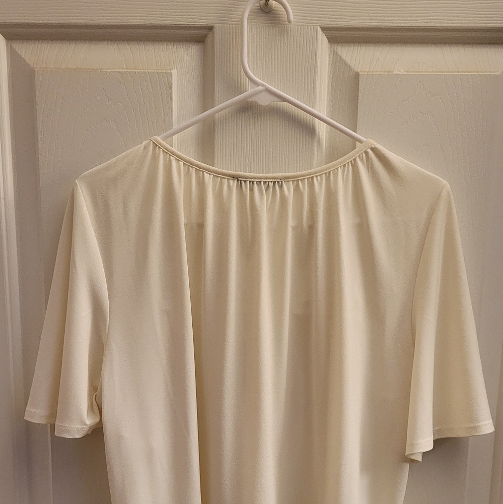 Large ivory blouse with lace across the neck. Adrianna Papell.